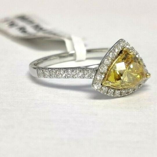 1-50ct-fancy-yellow-fancy-shape-diamond-halo-ring-in-platinum