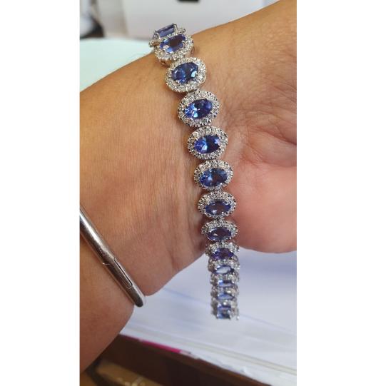 19-25-ct-oval-tanzanite-and-diamond-halo-bracelet-in-9k-white-gold